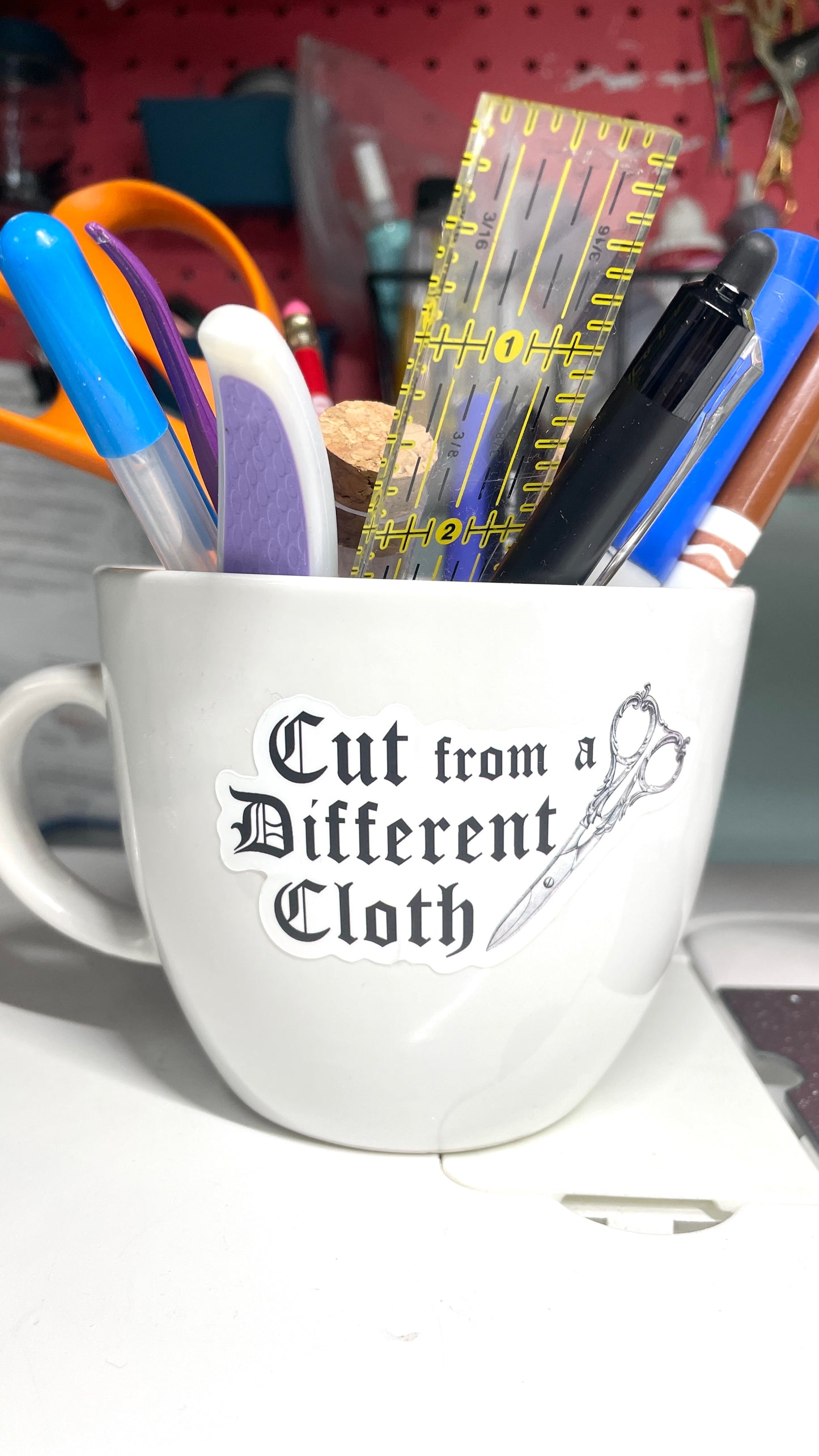 "Cut from a Different Cloth" Fundraising Sticker
